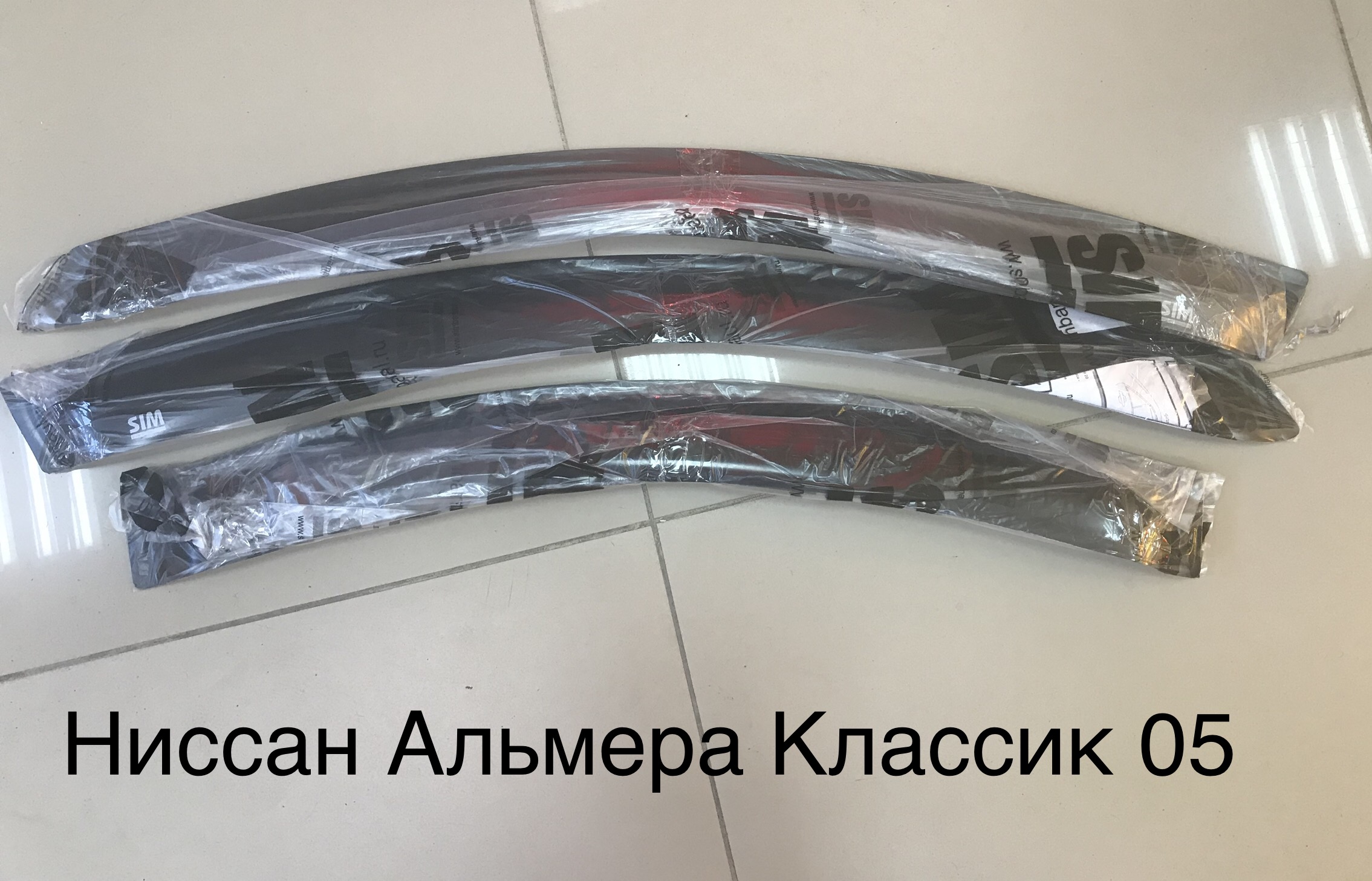 Дефлектор боковой двери Nissan Almera Classic 05-